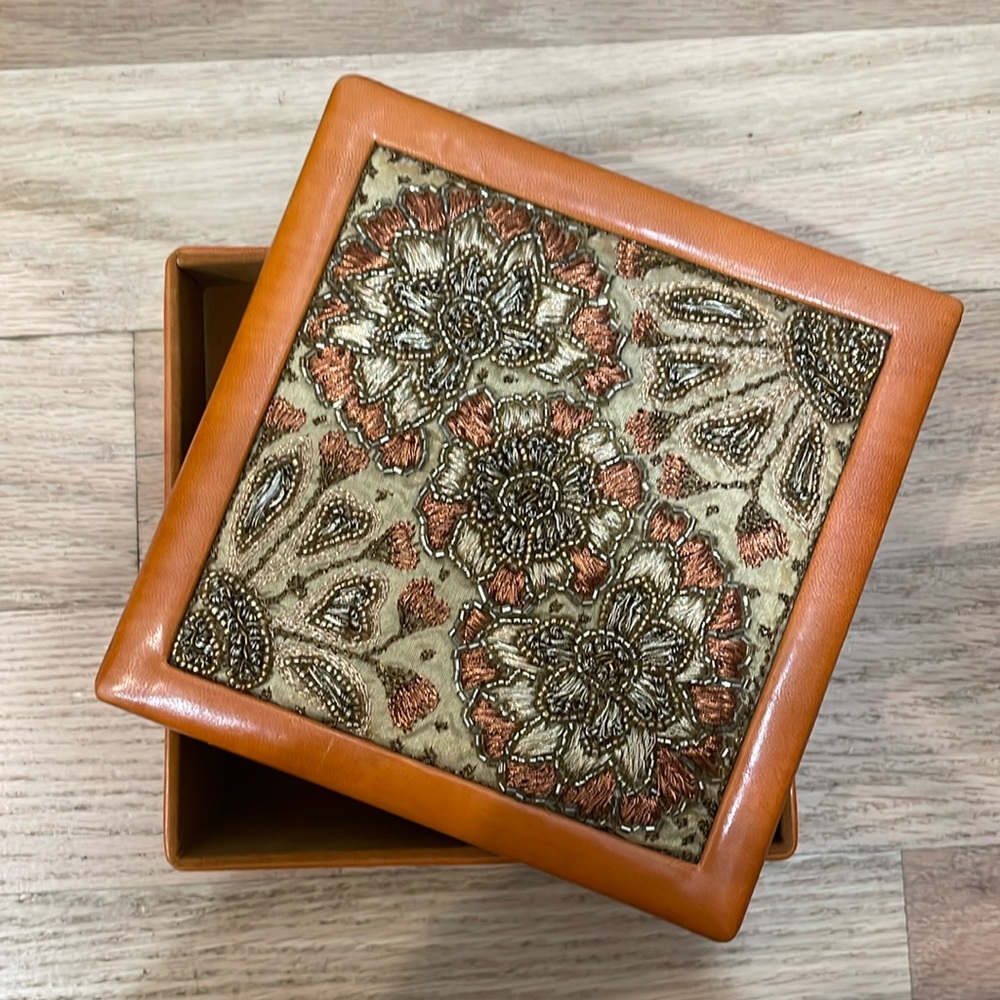 Embellished jewelry box with mirror inside